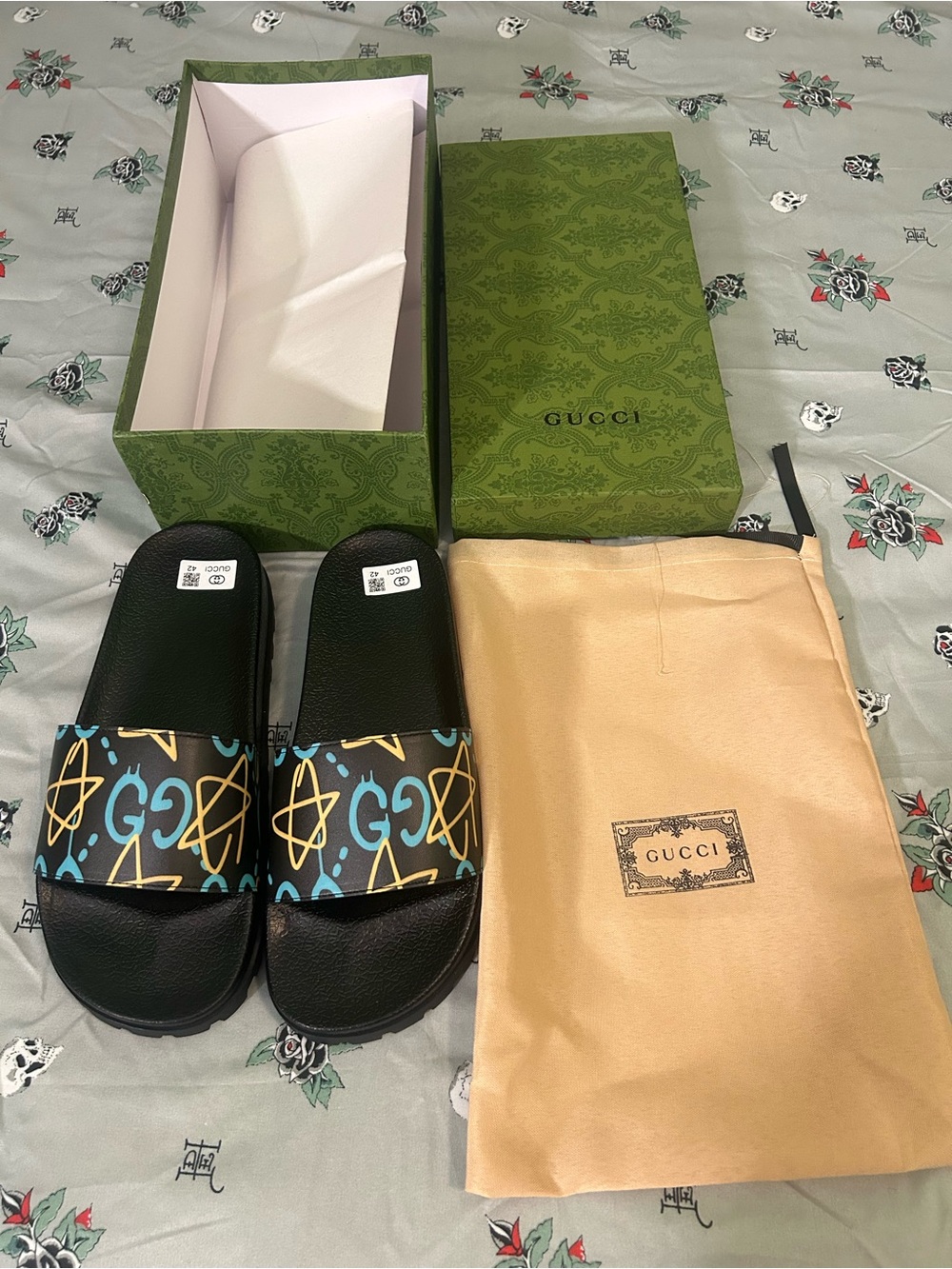 Gucci Black Slides with Blue and Gold Graphic Strap